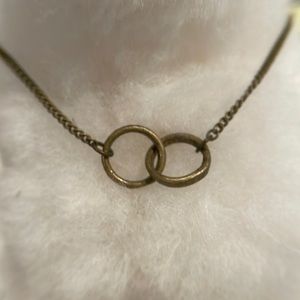 Brass colored interlocking ring necklace